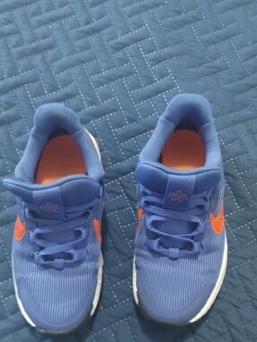 Nike Blue Kids Sneakers with Orange Swoosh